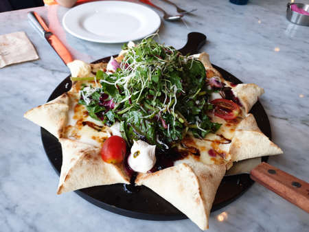 Eat salad pizzaの写真素材