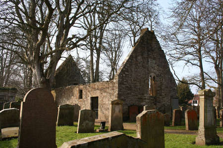 The ruined Auld Alloway Kirk, the setting for Robert Burns' poem 'Tam O'Shanter', in Ayrshire, Scotlandの写真素材