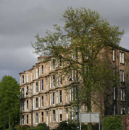 A block of tenements in the evening sun in Glasgow's west endの写真素材