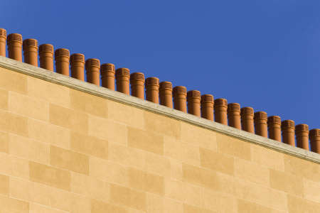 Terracotta chimneys on a tenement gable in Glasgow.の写真素材