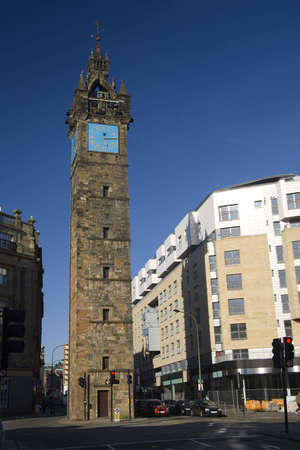Glasgow's Tolbooth Steeple on a sunny day with new building behind it.の写真素材
