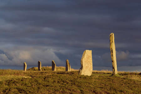 A portion of the Orkney neolithic site, the Ring of Brodgar, in evening sunlightの写真素材