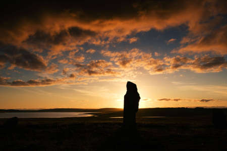 A stone of the Ring of Brodgar in Orkney at sunsetの写真素材