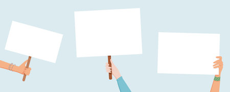 Hands hold blank signs at a protest.のイラスト素材