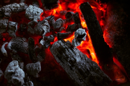 The texture of the dying coals in the fire