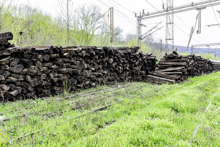 Pile of wooden railway sleepers - Old wooden railway sleepersの写真素材