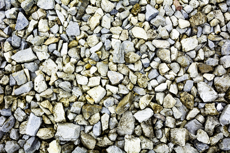 Top view on small weathered rocks - Pile of outdoor rocksの写真素材