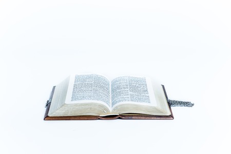 Open bible isolated on a white backgroundの写真素材