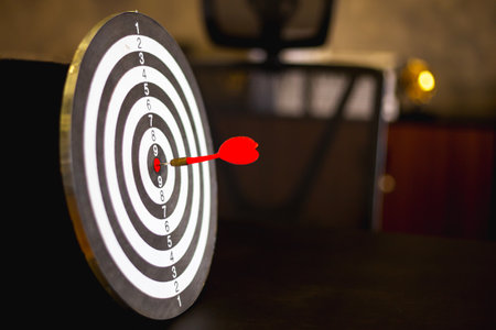 Dart is an opportunity and Dartboard is the target and goal.So both of that represent a challenge in business marketing as concept.の写真素材
