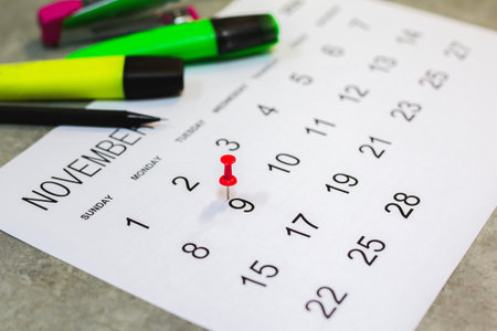Close up the calendar on the brown table in planning ideas.の写真素材