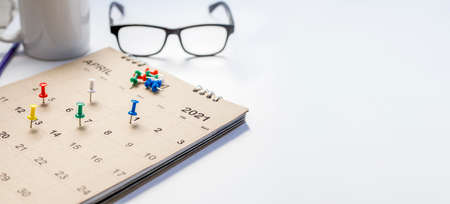 Close up of calendar on the table, planning for business meeting or travel planning concept.の写真素材