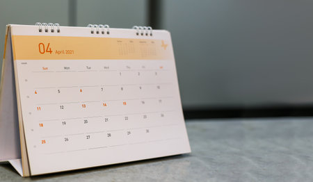 Close up the calendar on the brown table in planning ideas.の写真素材