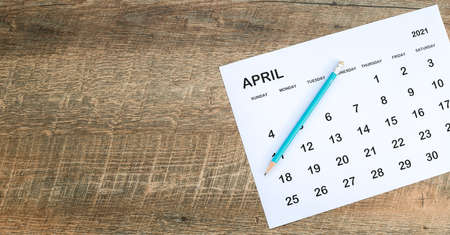 Close up the calendar on the brown table in planning ideas.の写真素材