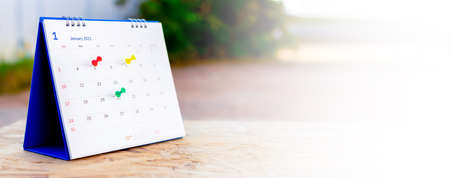 Calendar and scheduled appointments with pins.の写真素材