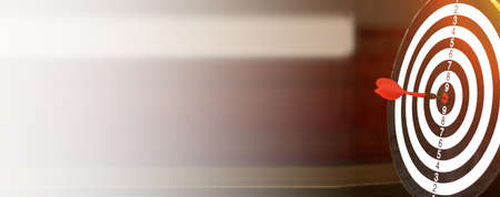 Dart is an opportunity and Dartboard is the target and goal.So both of that represent a challenge in business marketing as concept.の写真素材