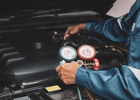Car air conditioner check service, leak detection, fill refrigerant.の写真素材