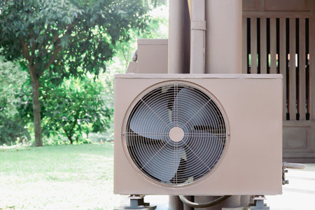 Air conditioner compressor installed outdoors.の写真素材