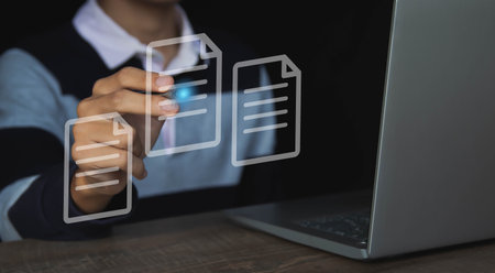 Use a computer with virtual screens and documents to approve paperless documentation and ERP...