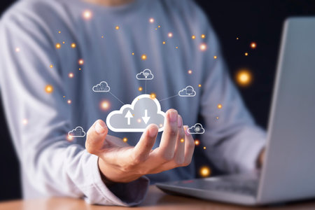 man using cloud computing showing in hand cloud technology storage Concepts of Storage Networks and Internet Servicesの写真素材