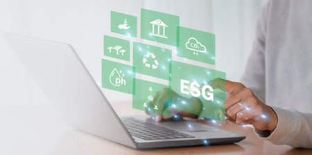 Eco energy concept on virtual screen. Businessman using laptop computer.