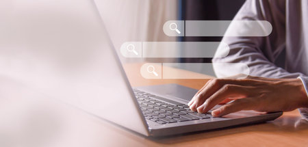 Searching Browsing Internet Data Information Networking Concept.businessman hand using laptop...