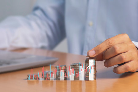 stacked coins with profit graph business growth business, finance, marketingの写真素材