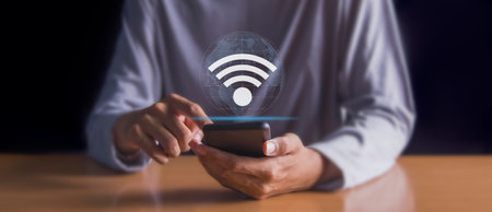 Business using smartphone with wifi icon,business communication conceptの写真素材