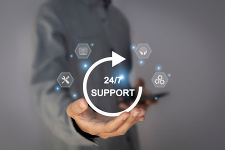 Businessman holds virtual support service icon 24h non-stop and full time contact of service concept...