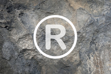 Copyright or patent intellectual property mark on stone background.の写真素材