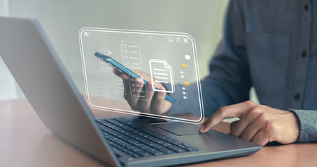 Businessman opens file on virtual screen to check data in cloud