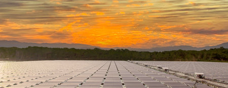 clean energy concept Solar Panels at Sunset, Panoramic View of a Solar Farm by