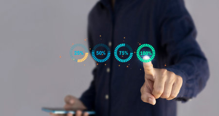 Young man showing battery power levelの写真素材