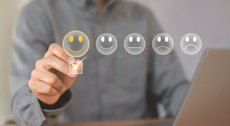Smiling face icon to show satisfaction with service. Rate the impression of customer service concept and satisfaction.の写真素材