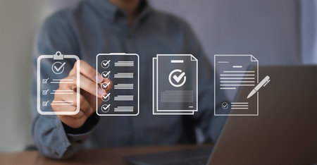 Digital document approval checklist on laptop screen. Productivity and business technology concept. Document validity management and online surveys. Enterprise business technology.の写真素材