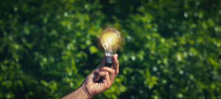 Portable light bulbs, natural energy and the concept of saving the world, creative ideas and inspirationの写真素材