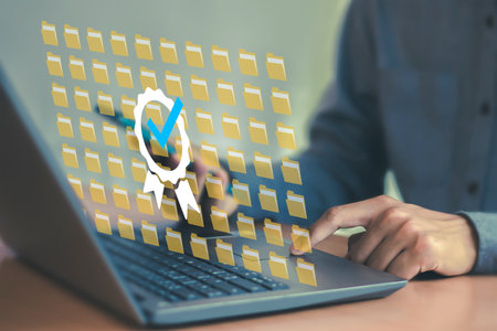 Digital document checklist on laptop screen. Business productivity and technology concept. Document accuracy management and clipboard. Online survey filling. Enterprise business teの写真素材