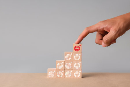 Wooden blocks symbol dartboard concept of planning and successの写真素材