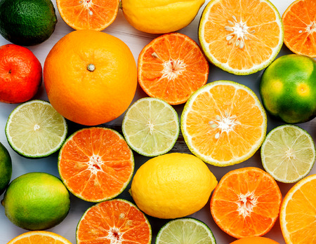 Citrus background. Assorted fresh citrus fruits. Lemon, orange lime,mandarin. Fresh and colorful concept. Top viewの写真素材