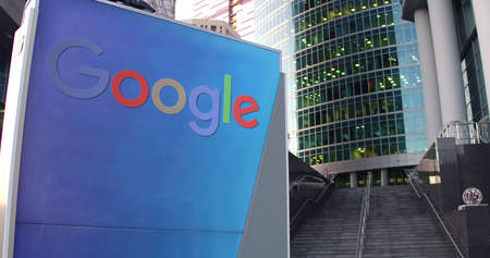 Street signage board with Google logo. Modern office center skyscraper and stairs background. Editorial 3D rendering United Statesのeditorial素材