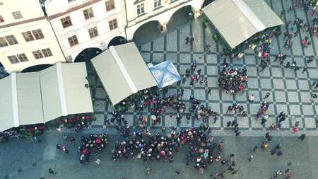 PRAGUE, CZECH REPUBLIC - DECEMBER 3, 2016. Top shot of tourists on old town square. Ancient european city viewのeditorial素材