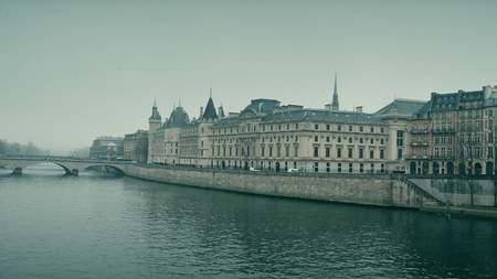 Seine river and famous Conciergerie, former prison, present law courts place in Paris, Franceの写真素材