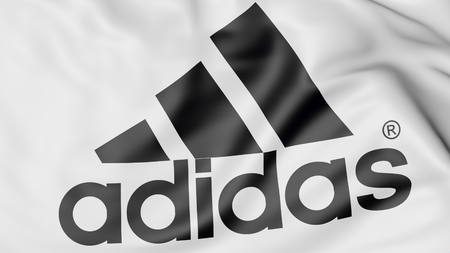 Close-up of waving flag with Adidas inscription and logo, editorial 3D renderingのeditorial素材