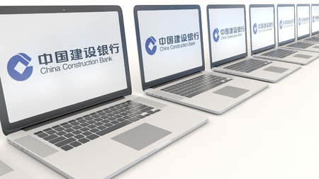 Modern laptops with China Construction Bank logo. Computer technology conceptual editorial 3D