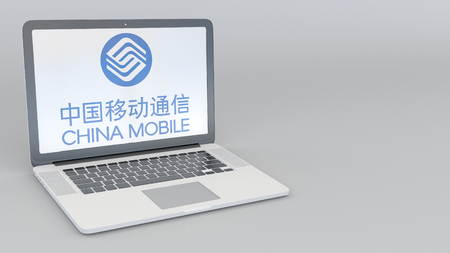 Laptop with China Mobile logo. Computer technology conceptual editorial 3D renderingのeditorial素材