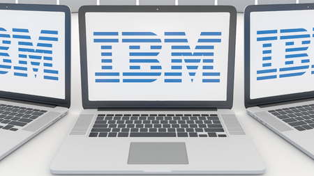 Laptops with IBM logo on the screen. Computer technology conceptual editorial 3D renderingのeditorial素材