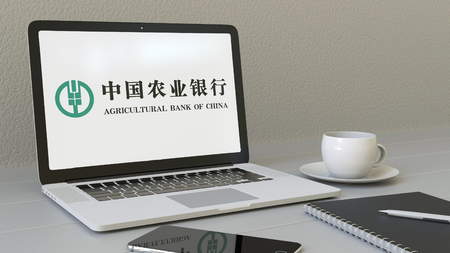 Laptop with Agricultural Bank of China logo on the screen. Modern workplace conceptual editorial 4K animationのeditorial素材