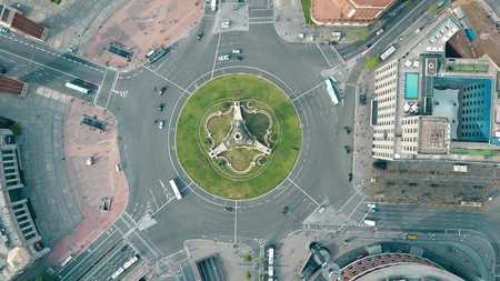 Aerial shot of Plaza de España in Barcelona, Spain. Roundabout city trafficの写真素材