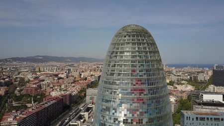BARCELONA, SPAIN - APRIL, 15, 2017. Torre Agbar skyscraper. City aerial shotのeditorial素材