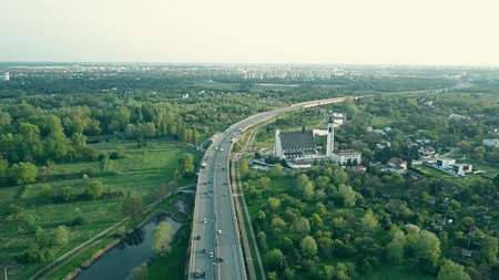 Aerial shot of a modern highway the eveningの写真素材