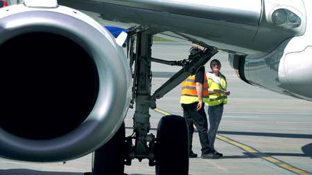 WARSAW, POLAND - MAY, 18, 2017. Boeing 737 commercial airliner being checked by the airport...